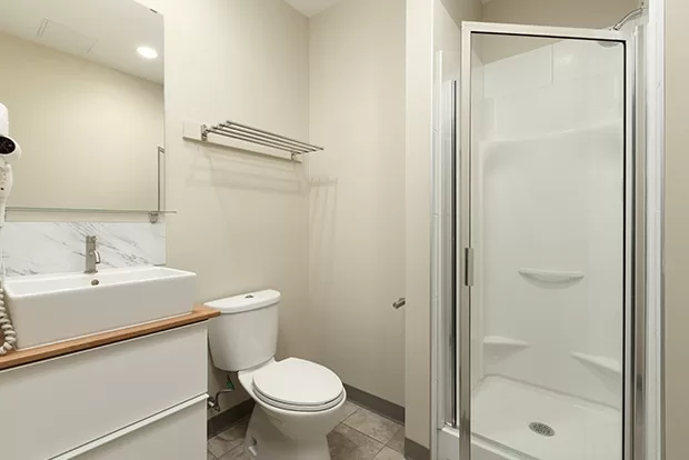 Bathrooms at GEC Viva student residence include a standing shower