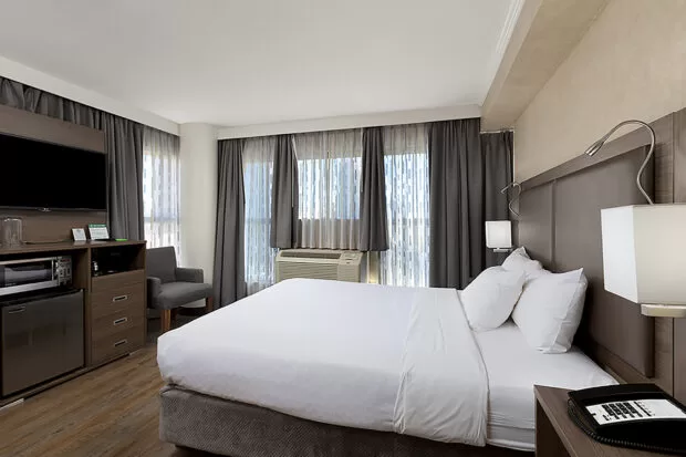 Downtown Vancouver GEC Granville Suites long term extended stays hotel premium furnished rooms with queen bed