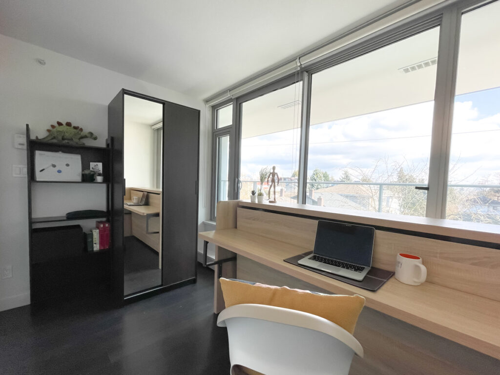 after gec housekeeping enters a room: all clean and tidy!
image shows a room with a wardrobe placed across from a study desk