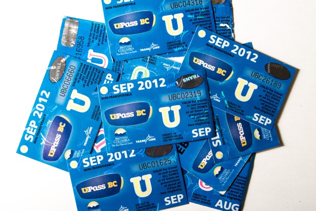 a bunch of u-pass cards spread around a white background