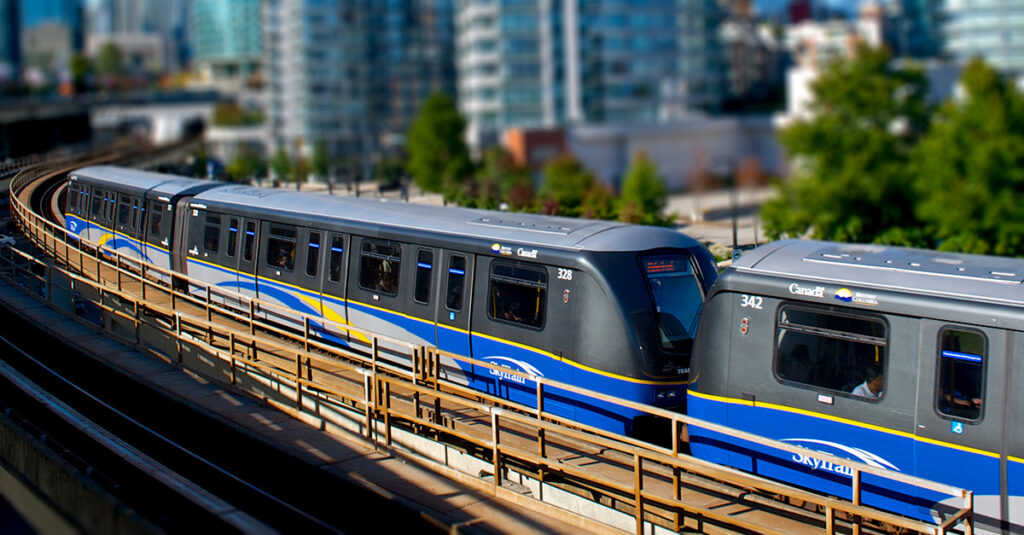 An image of the skytrain on the rails, one of the most commonly used Public Transit in Vancouver